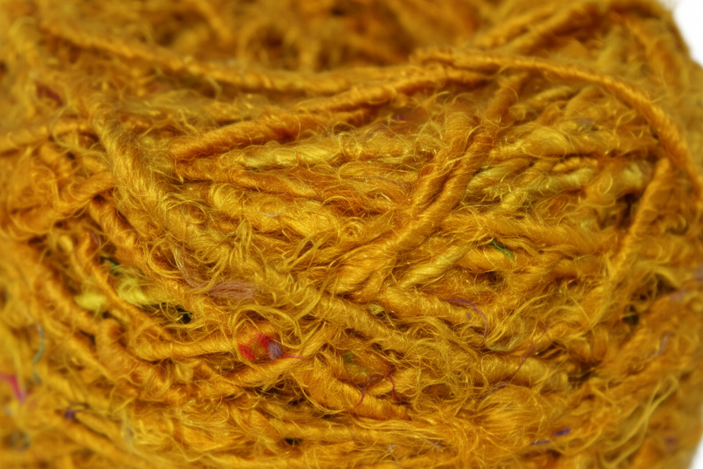 Close-Up - Amber Orange Yarn Texture